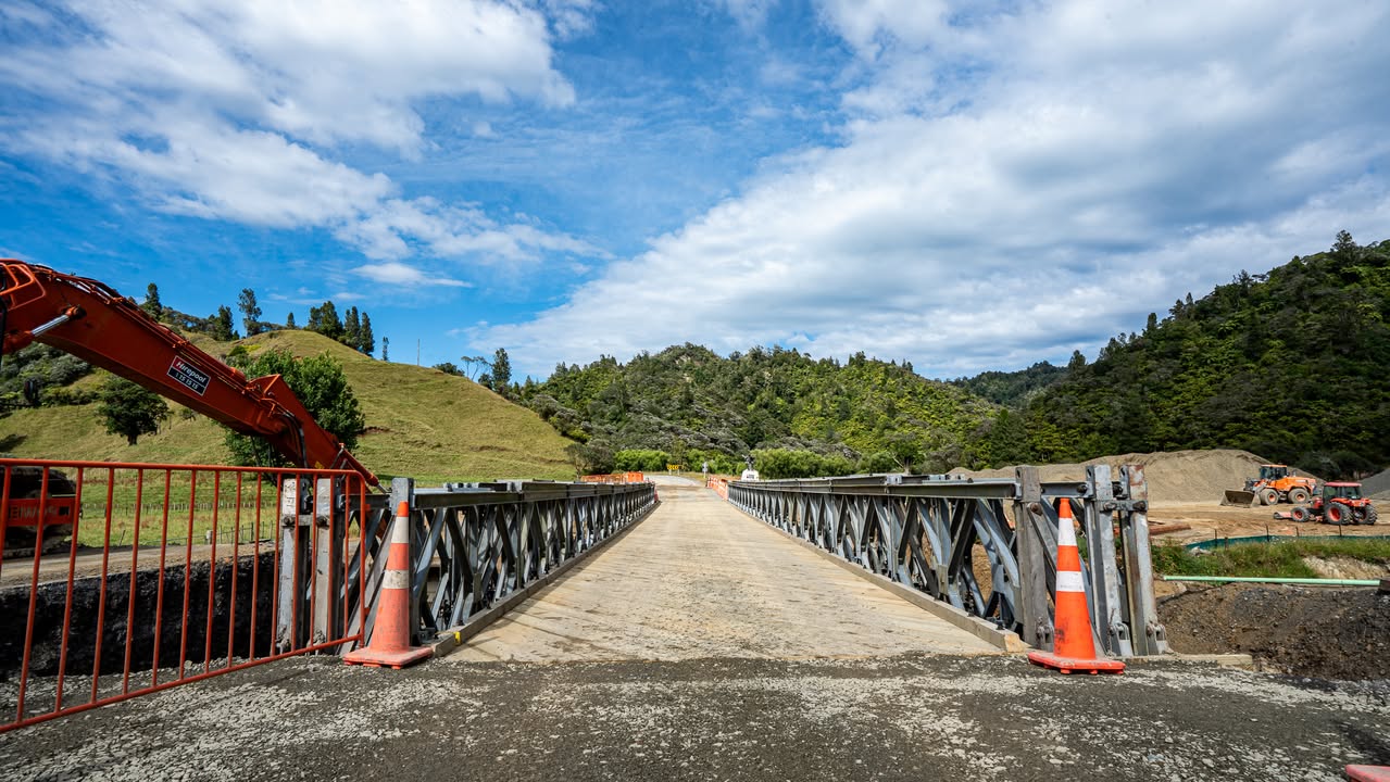 State Highway 3 north of New Plymouth has reopened complete with a new temporary Bailey bridge and a new box concrete…